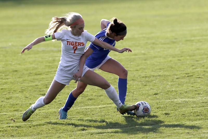 Crystal Lake Central's Sam Sander tries to keep Dundee-Crown's Berkley Mensik off the ball during a Fox Valley Conference soccer match Tuesday April 26, 2022, between Crystal Lake Central and Dundee-Crown at Dundee-Crown High School.