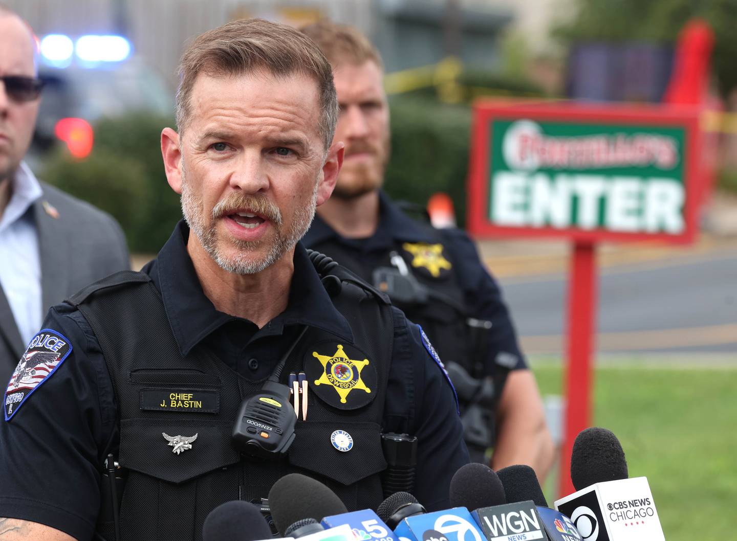 Oswego Police Chief Jason Bastin speaks Wednesday, July 30, 2025, during a press conference after a car crashed into the entrance of the Portillo’s at 2810 U.S. Route 34 in Oswego.