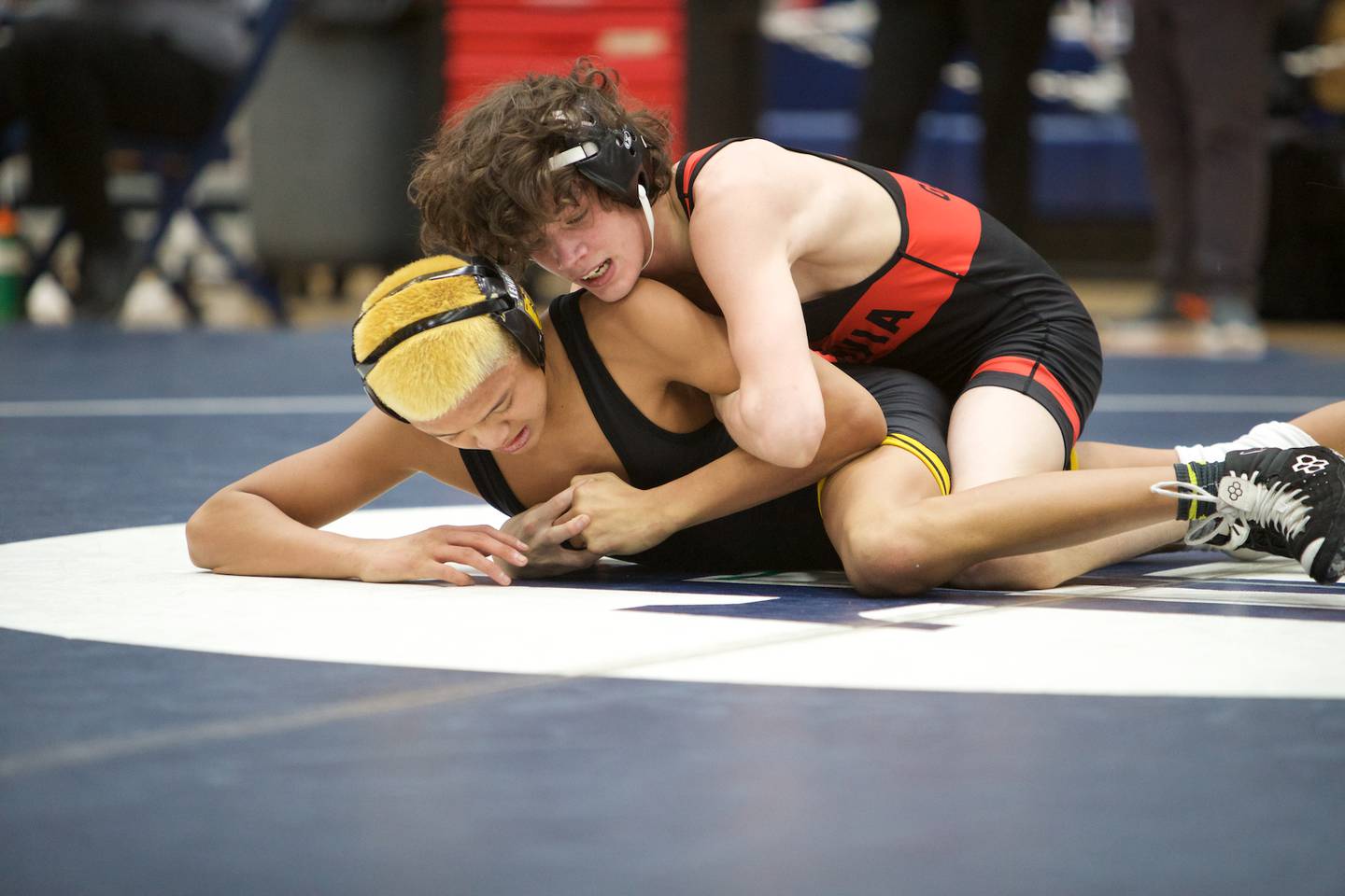 Batavia's Ino Garcia and Glenbard North's Kalani Kiev compete in the 113 lb. Finals at the DuKane Wrestling Conference meet at Lake Park High School on Saturday, Jan.21,2023 in Roselle.