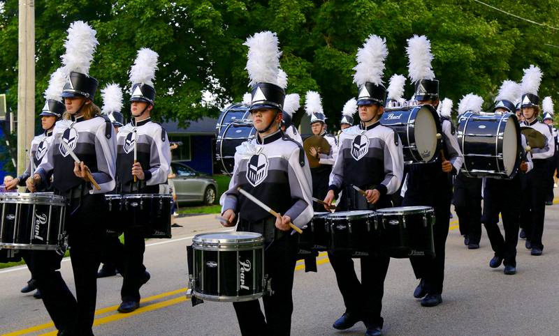 The percussion section of the Kaneland High School Marching Knights perform in the Kaneland Homecoming Parade in Kaneville on Wednesday, Sept. 14, 2022.