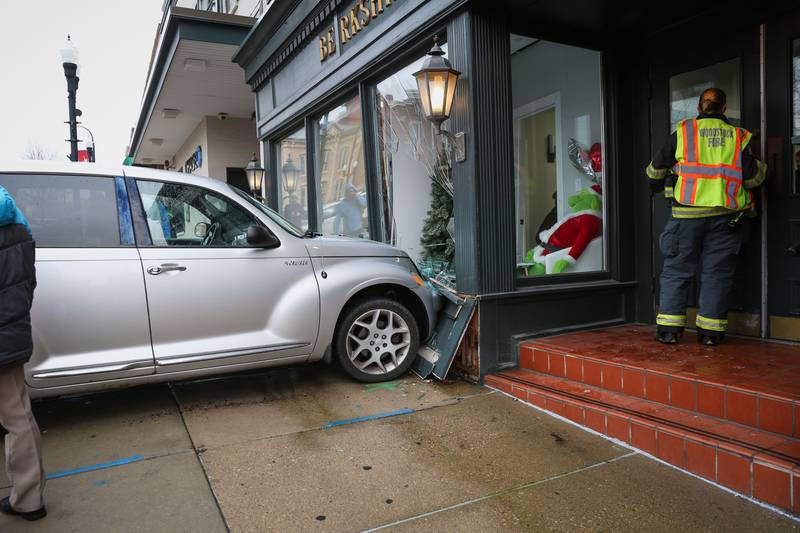 Car crashes into building at Woodstock Square Shaw Local