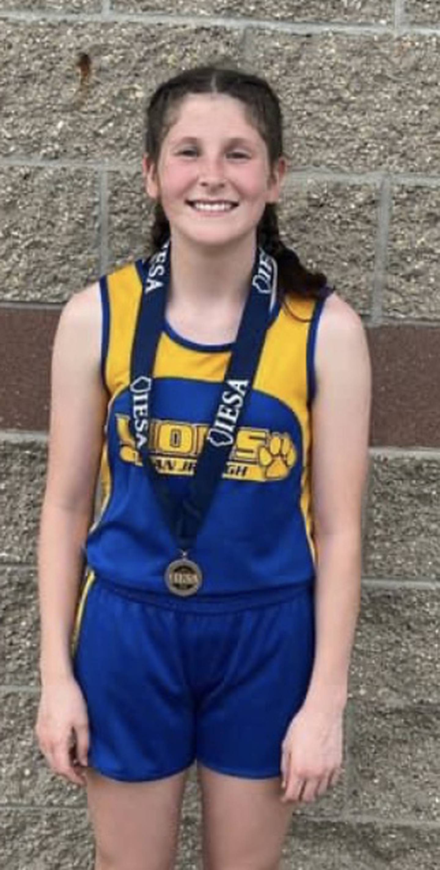 Princeton Logan's Camryn Driscoll won the IESA Class 3A eighth grade girls' 400-meter state championship Friday in East Peoria.