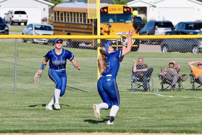 Princeton second baseman Kelsea Klingenberg track down fly ball in Thursday''s regional semifinals at Prather Field. The Tigresses beat Sandwich 9-6.