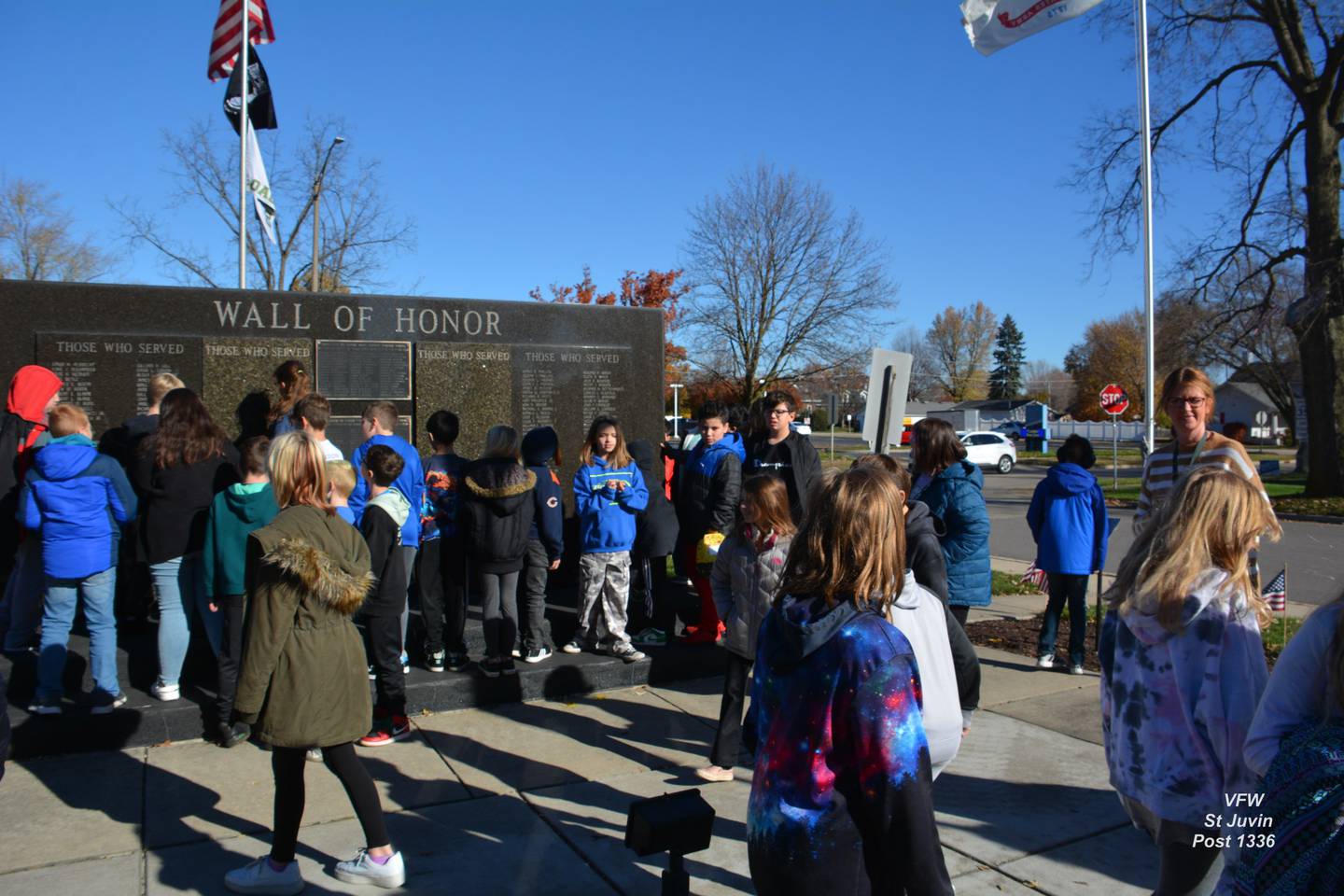 Intermediate School students view the more than 1000 names inscribed on the Memorial Wall of Honor.