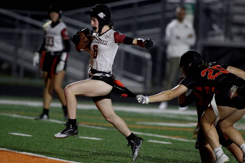 Antioch’s Abbigail Fuesling scores a touchdown against McHenry in IHSA Regional Title Game action flag football at McHenry High School in McHenry on Thursday, Oct. 10, 2024.
