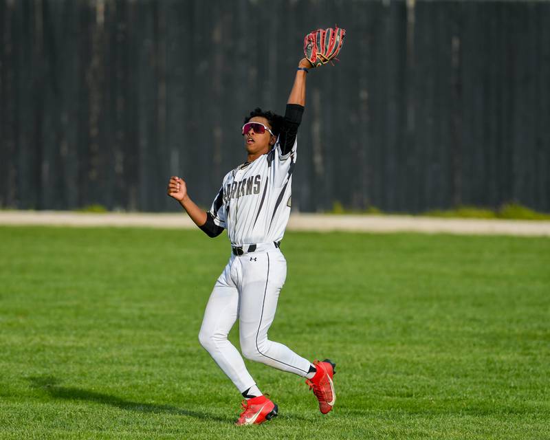 Sycamore's Tyler Townsend catches the ball for an out during the game on Wednesday May 1, 2024, while taking on Morris High School held in Sycamore.