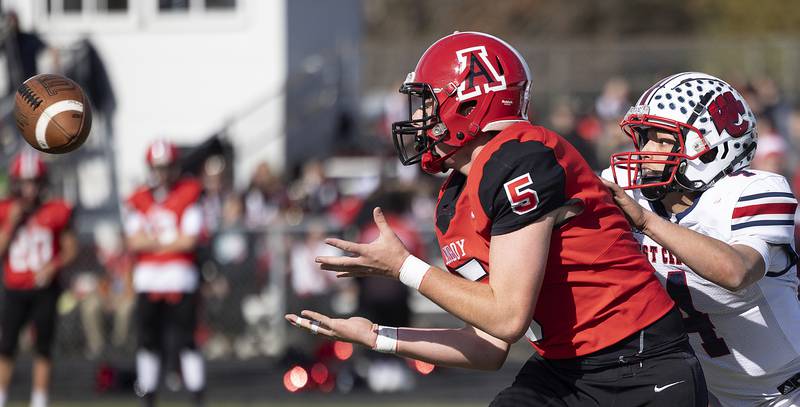 Amboy’s Rylan McNinch hauls in a pass against West Central’s Gage Stimpson Saturday, Nov. 2, 2024, in the 8-man football league first round playoffs.