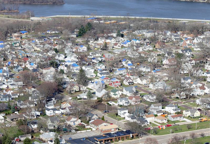 An aerial view of Ottawa's south side showing many tarps on rooftops from tornado damage on Wednesday, March 1 2017 in Ottawa.