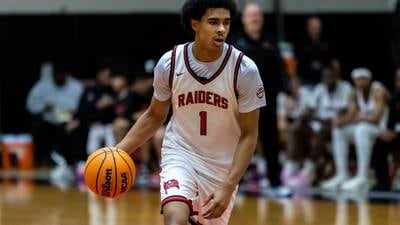 Photos: Oswego East vs. Bolingbrook Boys Basketball