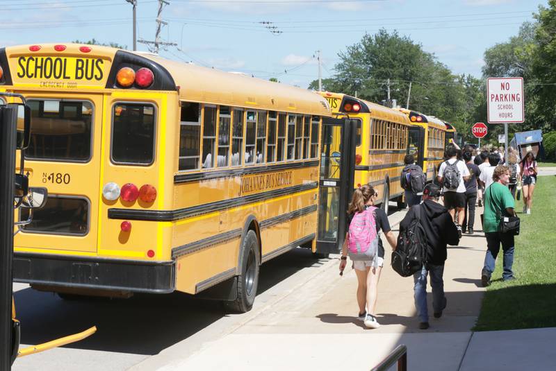 Students exit La Salle-Peru Township High School on the first day of classes on Wednesday, Aug. 10, 2022 in La Salle.