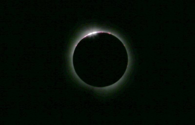 Bailys beads emerge from the sun as the suns rays are blocked by the moon during a total solar eclipse from Rend Lake near Whittington on Monday, April 8, 2024.