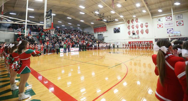 The National Anthem is sung as Ottawa and L-P meet for the 255th time in front of a large crowd on Friday, Feb. 7, 2025 in Sellett Gymnasium at L-P High School.
