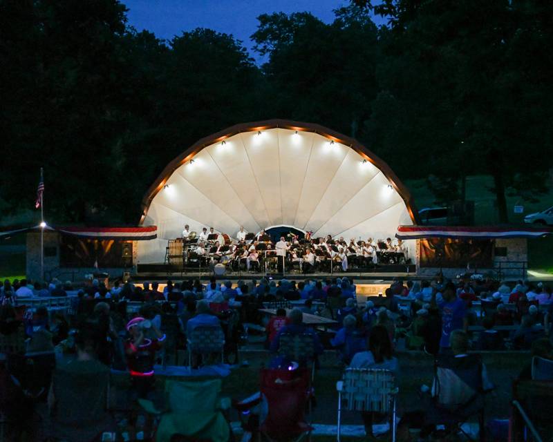 The DeKalb Municipal Band performs its annual Independence Day concert at the Dee Palmer Band Shell in Hopkins Park on Monday, July 4, 2022.