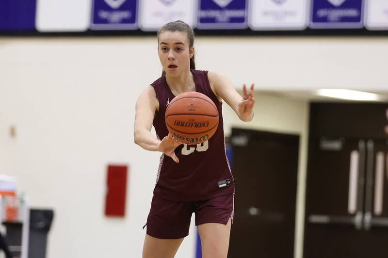 Lockport’s Paige Rannells passes against Lincoln-Way East in the Class 4A Lincoln-Way East Regional semifinal. Monday, Feb. 14, 2022, in Frankfort.