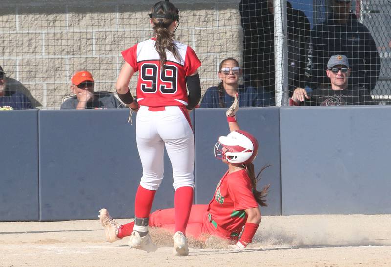 L-P's Callie Mertes steals home as Streator Pitcher Makenna Ondrey misses the tag during the Class 3A Regional semifinal game on Tuesday, May 27, 2025 at Pontiac High School.