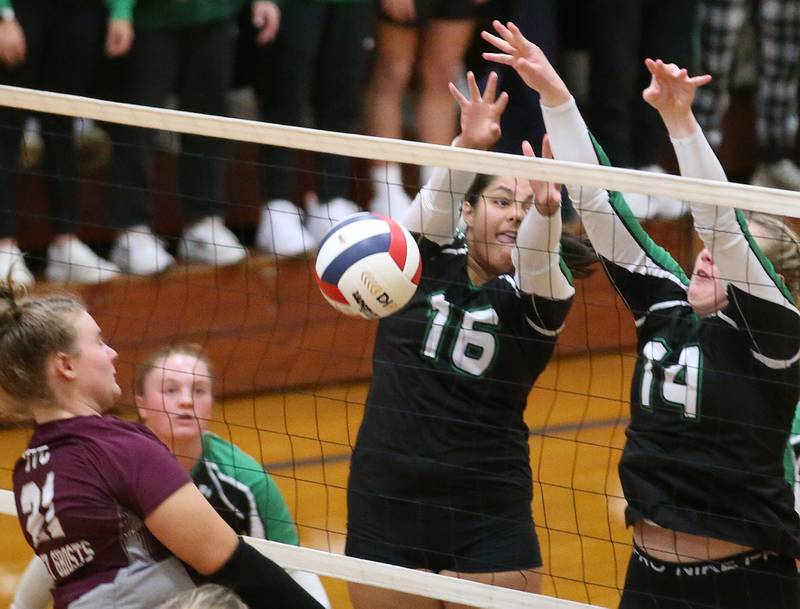 Rock Falls's Taylor Reyna and teammate Nicolette Udell block a spike from Illinois Valley Central's Lizzy Short during the Class 2A Sectional final game on Wednesday, Nov. 1, 2023 at Princeton High School.