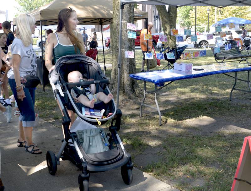 Large crowds attended the 4th annual Children’s Business Fair sponsored by Prairie Fox Books Saturday at Washington Park in Ottawa