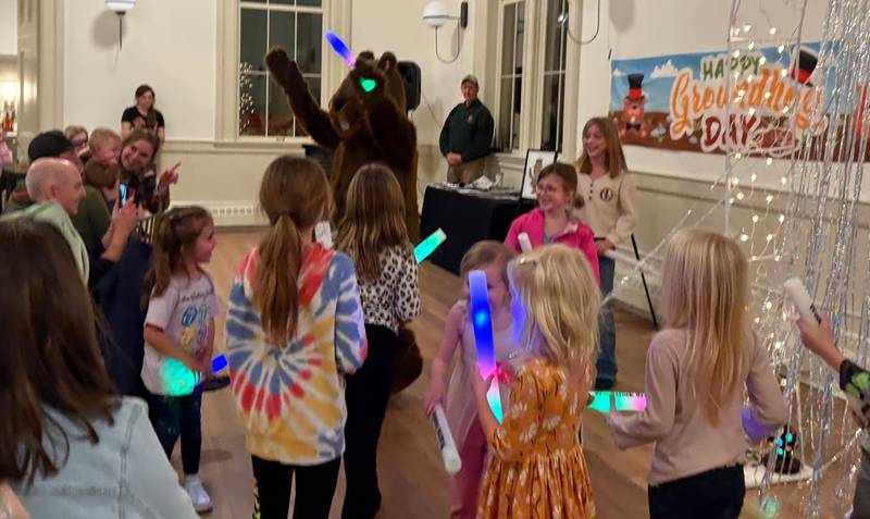 Woodstock Willie dances with children during Groundhog Day kickoff event Thursday, Jan. 30. The main event is Sunday, Feb. 1, with the early-spring forecast.