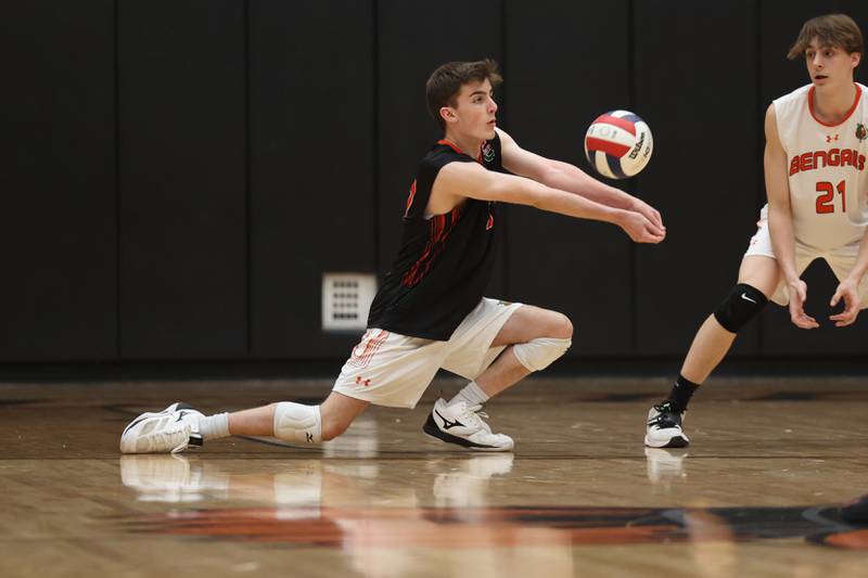 Plainfield East’s Evan Whaley digs out the serve against Lincoln-Way West on Wednesday, March 22nd. 2023 in New Lenox.
