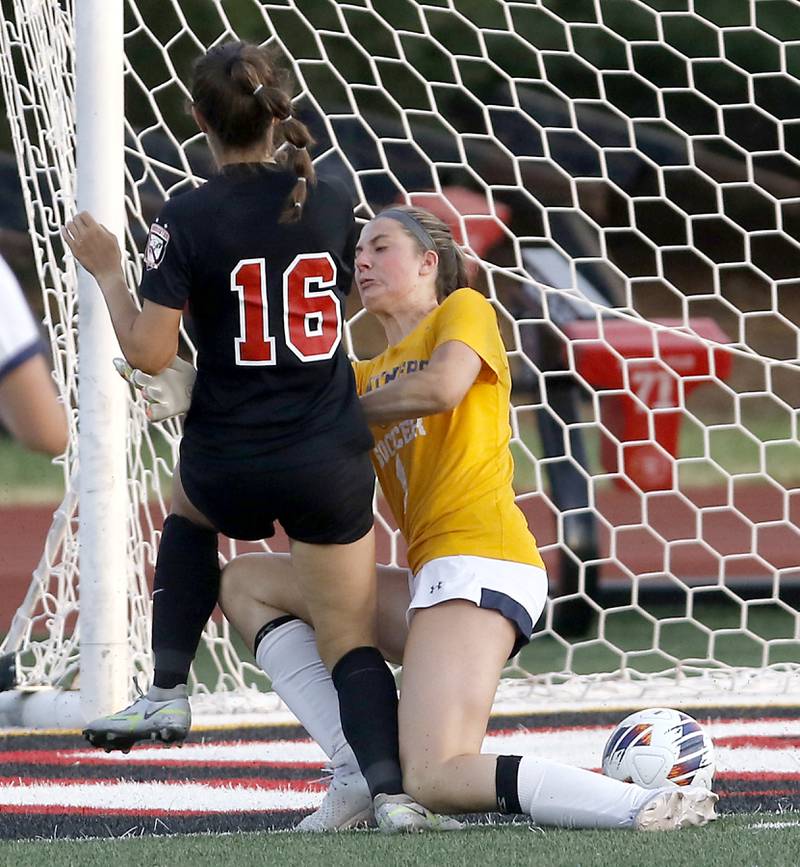 Barrington's Sarah Sarnowski collides with O'Fallon's Kendall Joggerst as she tries to score during the IHSA Class 3A state championship match at North Central College in Naperville on Saturday, June 3, 2023.