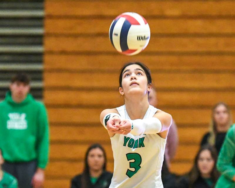 York's Emma Braathen (3) bumps the ball while keeping her focus during the regional game on Thursday Oct. 30, 2025; while taking on Lyons Township held at York High School.