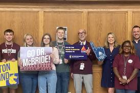 Lockport Township High School salutes superintendent as he prepares to run Boston Marathon