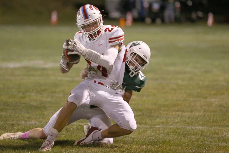 Ottawa's Weston Averkamp is taken down by St. Bede's Phillip Gray  on Friday, Oct. 25, 2024 at St. Bede Academy.