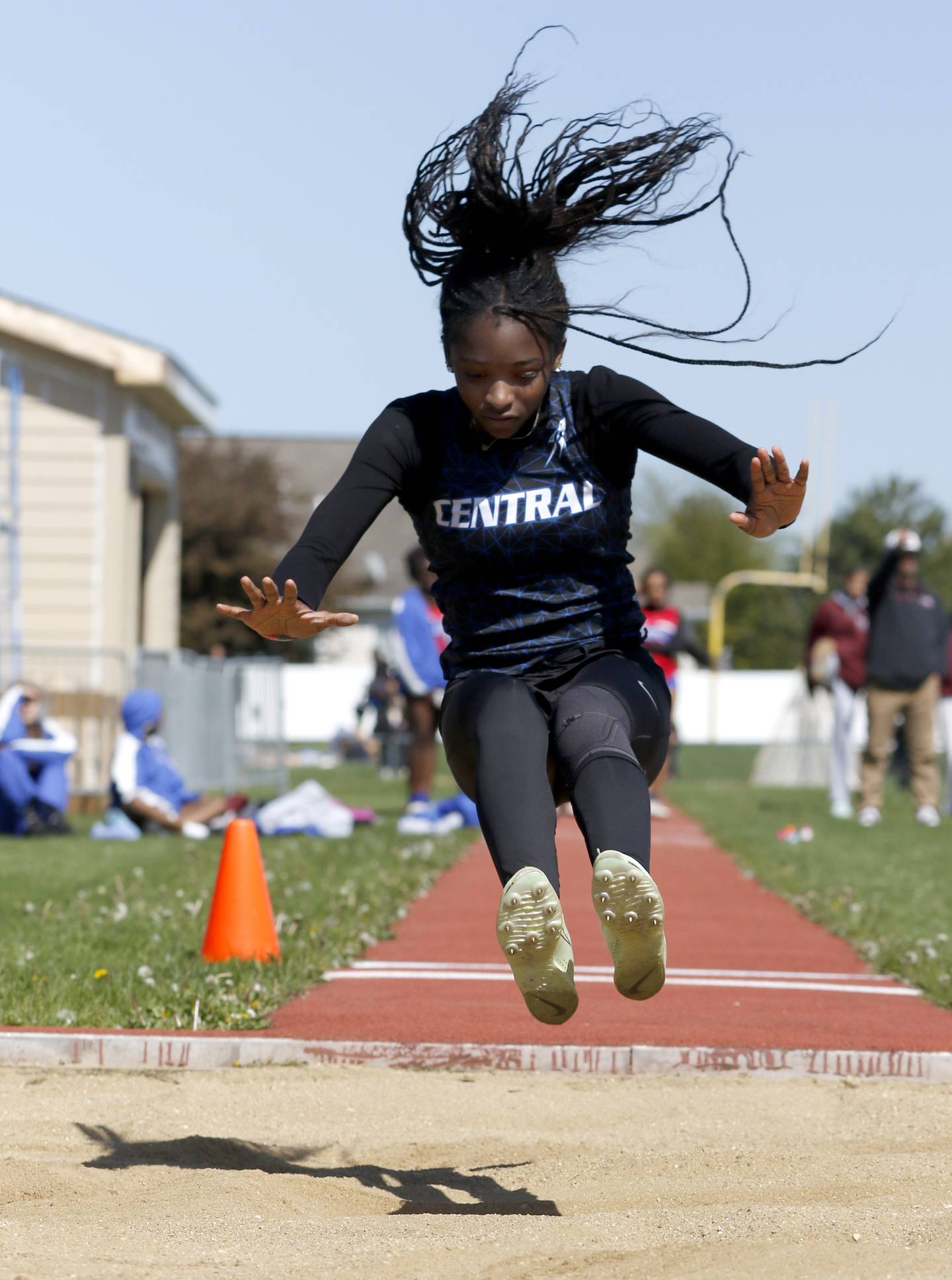 Burlington Central's LaRaiya Cunningham-Duncan long jumps on Thursday, May 8, 2025, during the Fox Valley Conference Girls Track and Field Meet at Huntley High School.