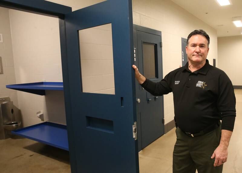He's open for business -- or at least he'd like to be. Bureau County Sheriff Jim Reed, seen here Tuesday, Jan. 28, 2025, outside a vacant cell in Bureau County Jail, is urging skeptics to reconsider a plan to house inmate transfers from Cook County. With the resulting funds, Reed would like to add two more patrol officers to police the many under-served municipalities in Bureau County.