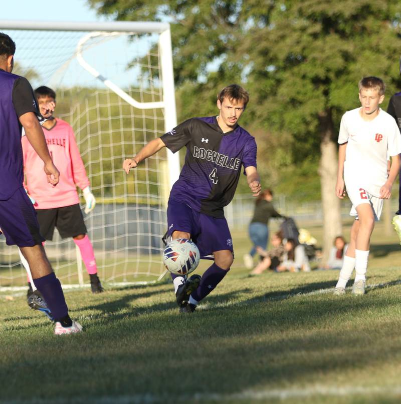 Rochelle's Eliud Lombardia (4) dribbles the ball during the Hubs' game with La Salle-Peru on Oct. 9, 2025.