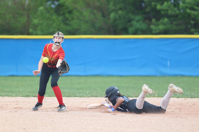 Clifton Central's Rayven Perkins slides into second as St. Anne's Tatum Kirkand receives a throw during Clifton Central's 9-3 victory over St. Anne in the Class 1A Dwight Regional quarterfinal game at Central High School.