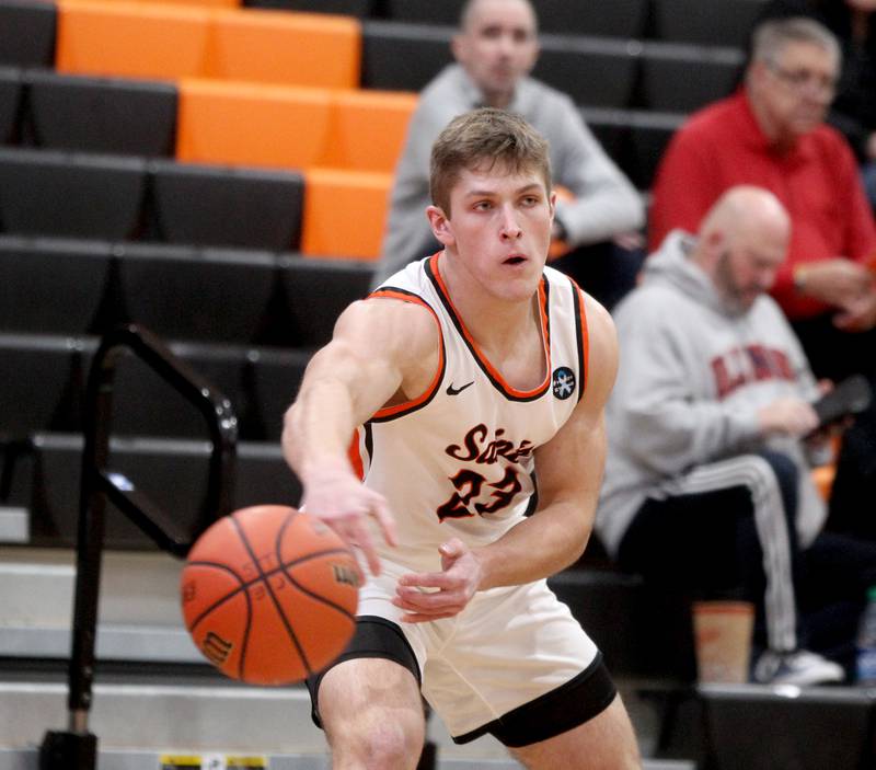 St. Charles East’s Parker Radler passes the ball during a game against East Aurora in the 63rd Annual Ron Johnson Thanksgiving Tournament at St. Charles East on Monday, Nov. 21, 2022.