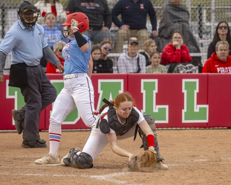 LaSalle Peru's Addie Duttlinger scoops the throw home out of the dirt for the force out during the game against Ottawa at the L-P Athletic Complex on April 22, 2024.