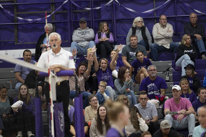 Dixon volleyball super fans celebrate the team on senior night against Winnebago Tuesday, Oct. 22, 2024.