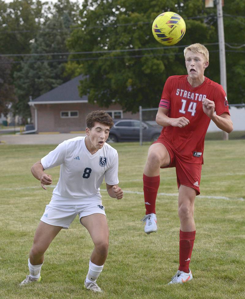 Plainfield South’s Ryan Sikora and Streator’s Joe Hoekstra collide while going up for a header in the 1st half during match Tuesday at Streator.