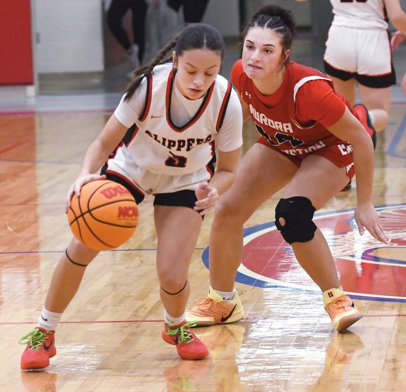 Amboy's Sydney Whelchel (2) protects the ball from an Aurora Christian player at the Oregon Girls Tip-Off Tournament on Wednesday, Nov. 19, 2025  in Oregon.