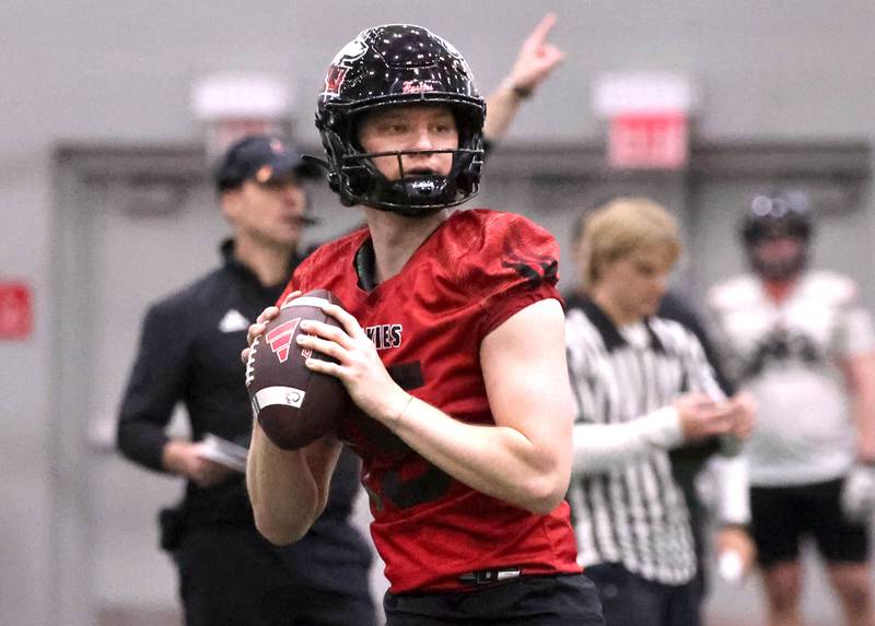 Northern Illinois quarterback Josh Holst, from Marengo, looks for a receiver during the first spring football practice Thursday, March 27, 2025, in the Chessick Practice Center at NIU in DeKalb.