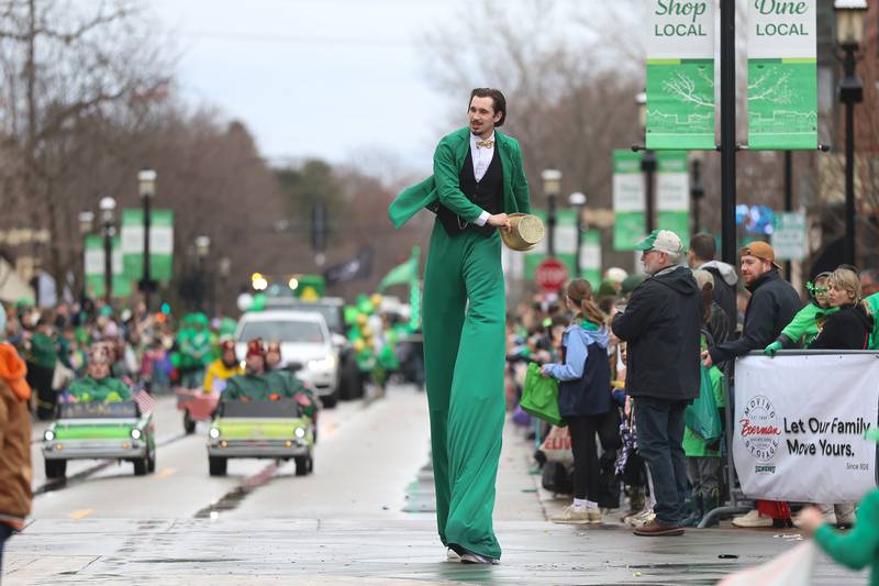 A perform on stilts walks along the parade route at the annual Plainfield Hometown Irish Parade on Sunday, March 15, 2026 in Plainfield.