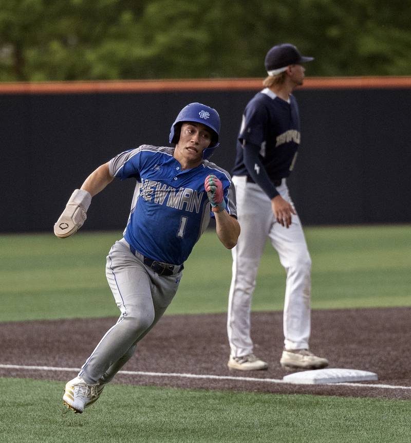 Newman’s Garret Matznick rounds third to score against Teutopolis Friday, June 6, 2025, during the Class 2A state semifinal at Illinois Field in Champaign.