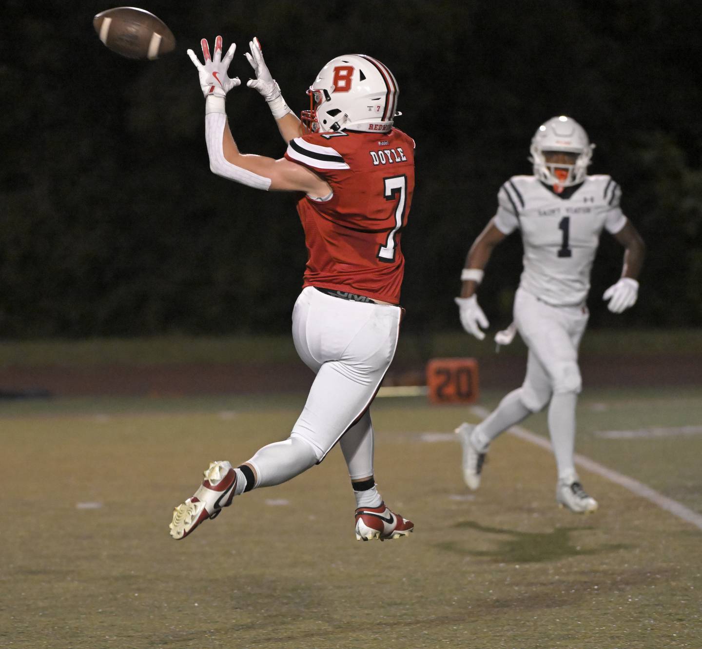 Benet Academy’s Luke Doyle catches a first down pass over the middle against Saint Viator in a football game at Benedictine University in Lisle on Friday, Sept. 20, 2024.