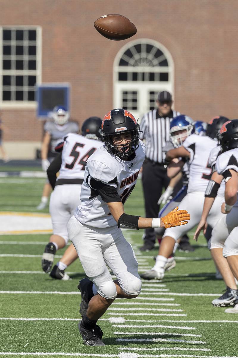 Kewanee’s Chris Crowe chases a high snap on a point attempt against Newman Saturday, Oct. 18, 2025.
