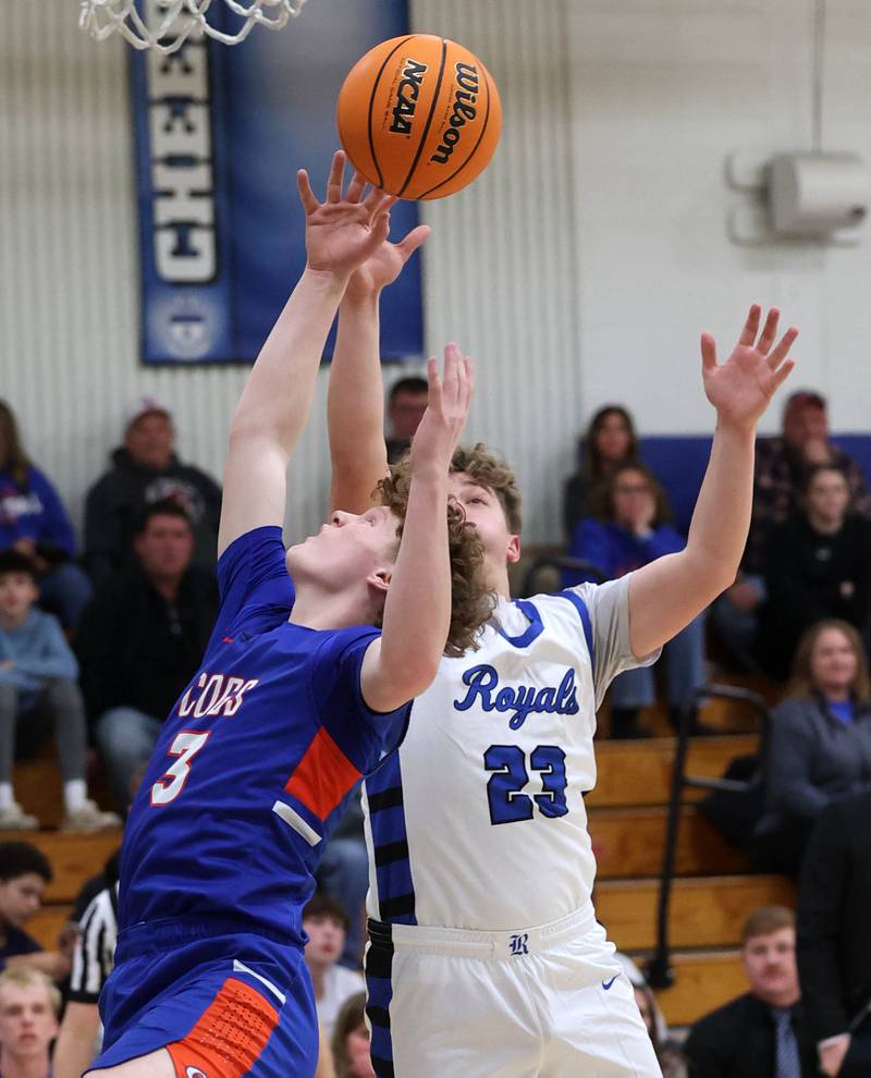 Genoa-Kingston's Jack Peterson (left) and Hinckley-Big Rock's Luke Badal go after a rebound during their game Tuesday, Jan. 7, 2025, at Hinckley-Big Rock High School.