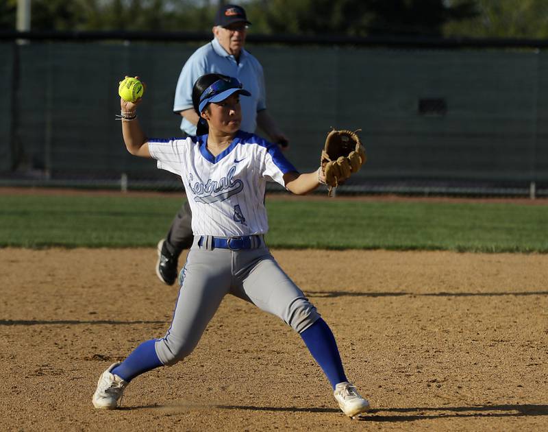 Burlington Central's Mei Shirokawa throws to first base during a Fox Valley Conference softball game against Hampshire on Tuesday, April 21, 2026, at Hampshire High School.