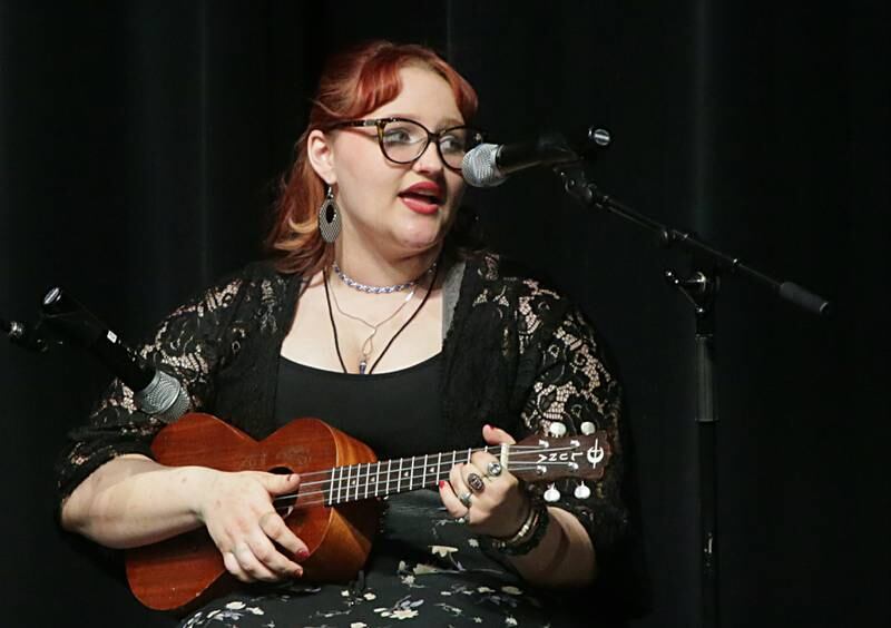 Luna Petrosius sings a solo during the 48th annual Fine Arts Festival on Thursday, March 17, 2022 at Ottawa High School.