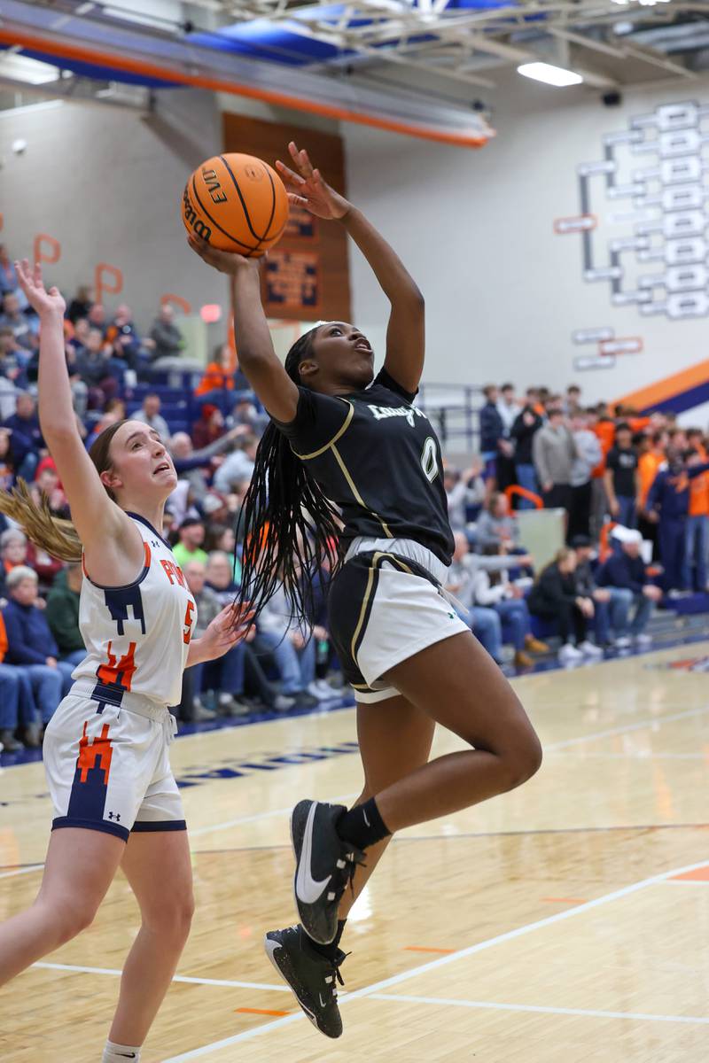 Bishop McNamara’s Mahlyia Johnson goes for a layup during the Fightin’ Irish’s 46-32 loss to Pontiac in the IHSA Class 2A Pontiac Sectional semifinal on Tuesday, Feb. 24, 2026, at Pontiac Township High School.