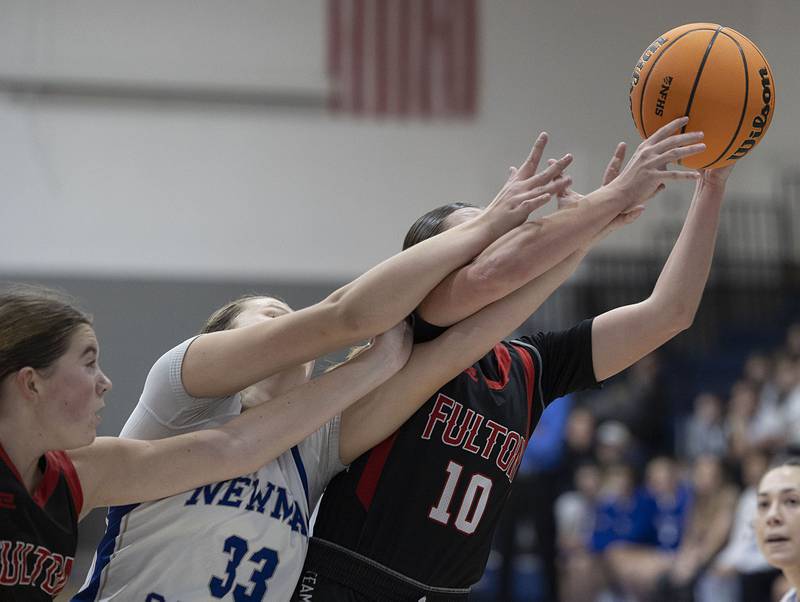 Newman’s Veronica Haley looks for a rebound against Fulton’s Wrenn Coffey Tuesday, Nov. 25, 2025.