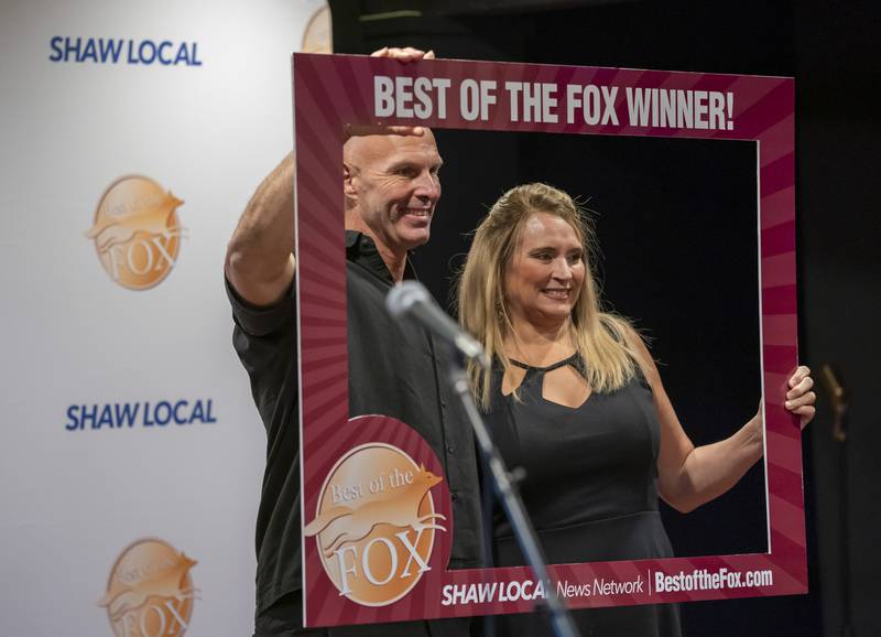 David and Michelle Meintz of Clean Bee Flooring & Upholstery Care in McHenry, have a photo taken as they celebrate their award during the Northwest Herald Best of the Fox awards ceremony on Thursday, September 19, 2024 at Lou's Lounge at the Dole Mansion in Crystal Lake. Ryan Rayburn for Shaw Local
