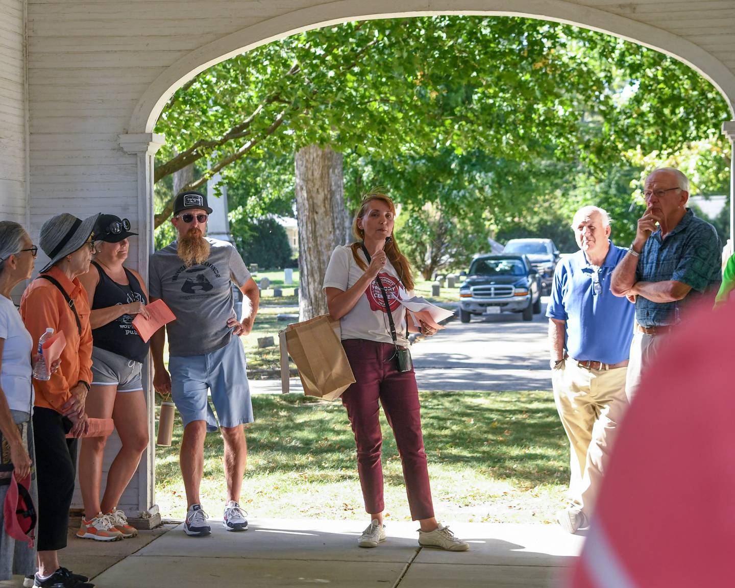 DeKalb County History Center Executive Director Michelle Donahoe welcomes community members on Sunday Oct. 5, 2025, before the start of the Etched in Stone cemetery walk held at Elmwood cemetery in Sycamore.