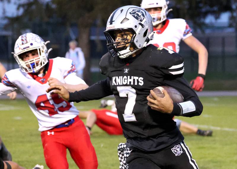 Kaneland's Jalen Carter gets outside of the Lakes defense Saturday, Nov. 1, 2025, during their first round playoff game at Kaneland High School in Maple Park.