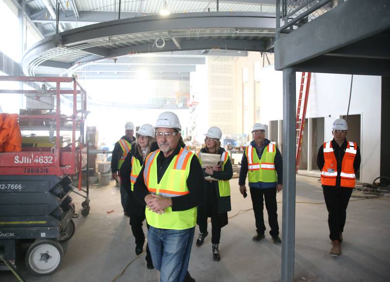 Ottawa YMCA director Joe Capece leads a group through the new YMCA building on Wednesday Jan. 24, 2024 in Ottawa.